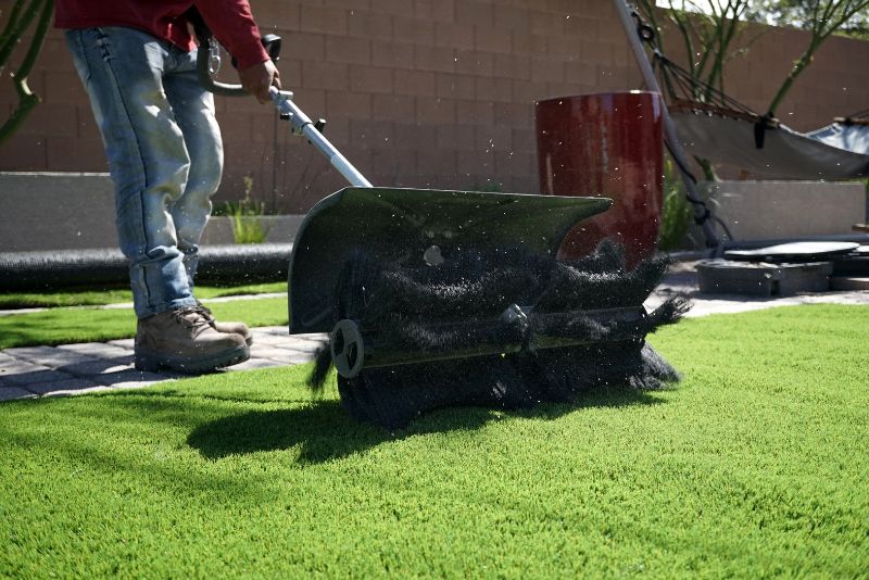 brushing over synthetic grass